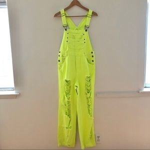 Yellow distressed overalls